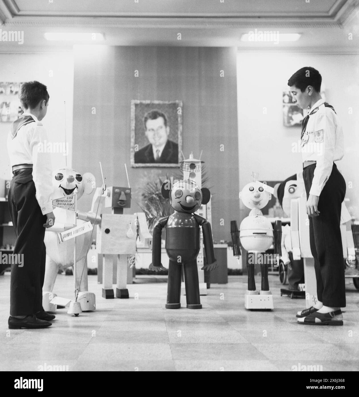 Socialist Republic of Romania in the 1970s.  'Pioneers'- student in elementary/ middle school wearing the standardized uniform. Winners of a technical competition at 'The Pioneer's House' displaying their work. Stock Photo