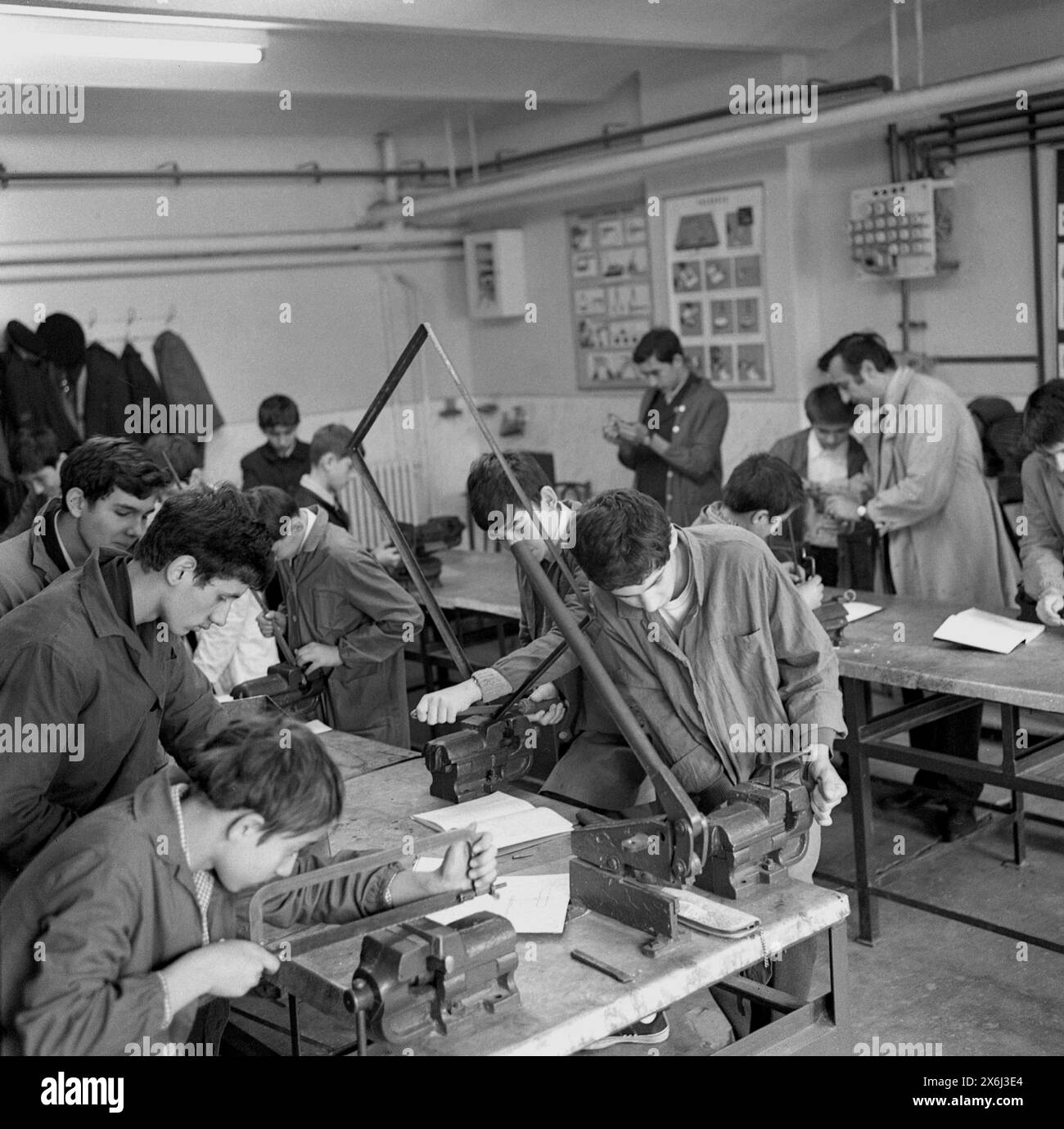 Socialist Republic of Romania in the 1970s. Students in the workshop of a governmental vocational school. Stock Photo