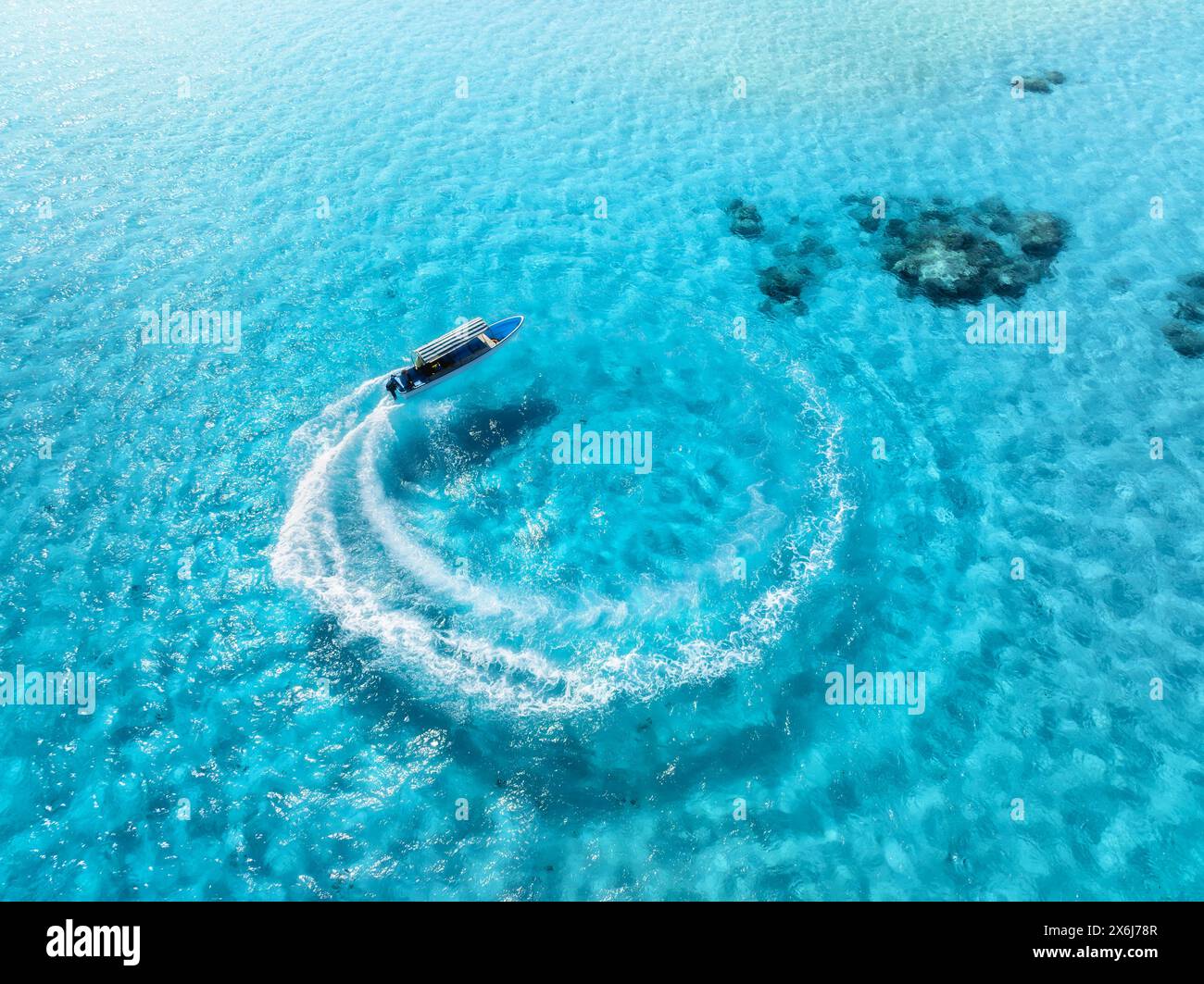Aerial view of the speed boat in clear blue water in summer Stock Photo ...