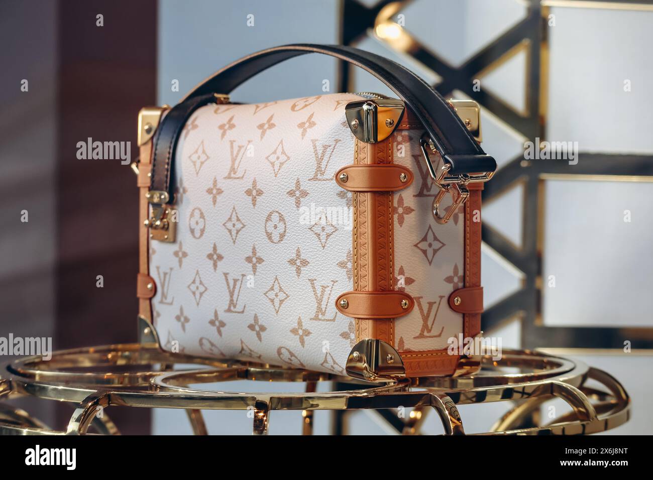 Nice, France - 28 January 2024: Louis Vuitton bag in the window of a flagship boutique in Nice Stock Photo