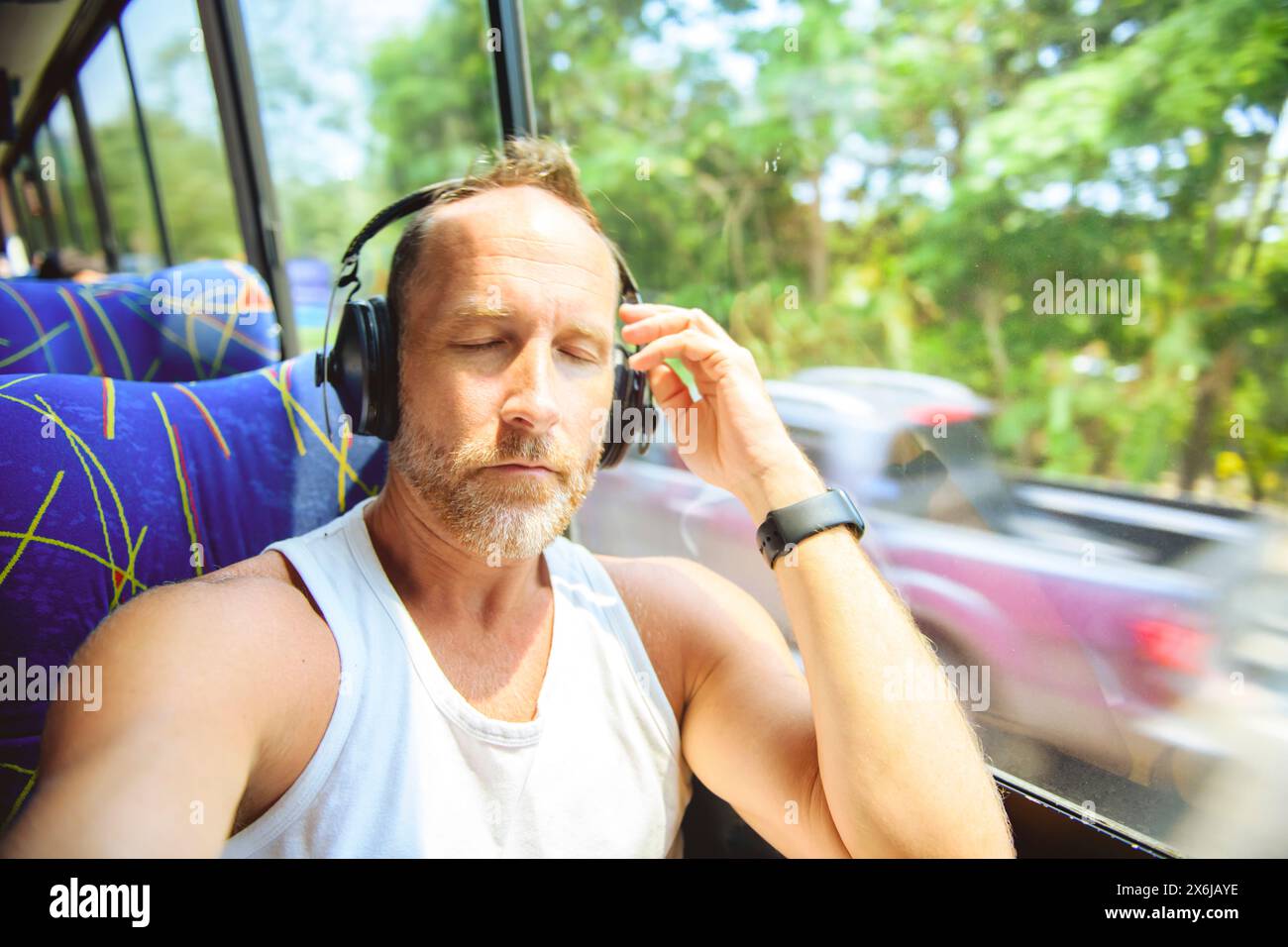 Great man riding in a traveler bus in costa Rica Stock Photo - Alamy