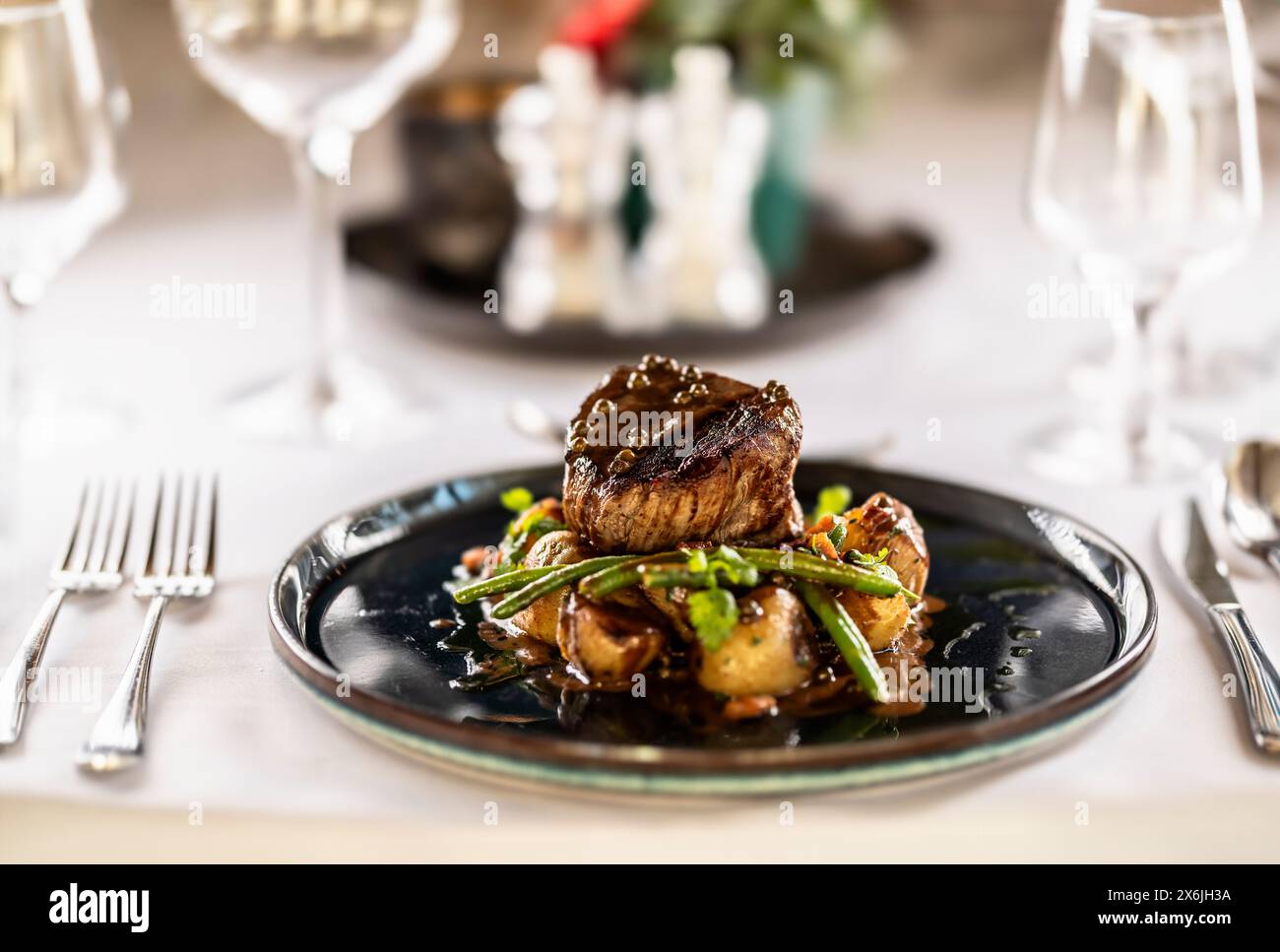 Beef Jacket Fillet steak of beef, sautéed green beans with bacon, jacket potatoes ...