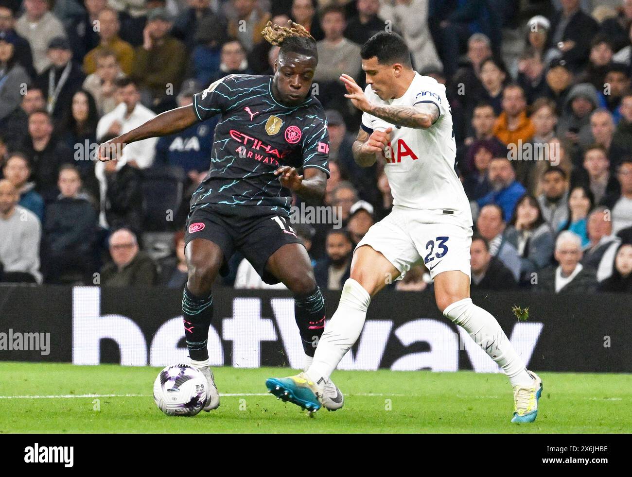 London, UK. 14th May, 2024. Jeremy Doku of Manchester City and Pedro Porro of Tottenham Hotspur in action . Premier League match, Tottenham Hotspur v Manchester City at the Tottenham Hotspur Stadium in London on Tuesday 14th May 2024. this image may only be used for Editorial purposes. Editorial use only pic by Sandra Mailer/Andrew Orchard sports photography/Alamy Live news Credit: Andrew Orchard sports photography/Alamy Live News Stock Photo