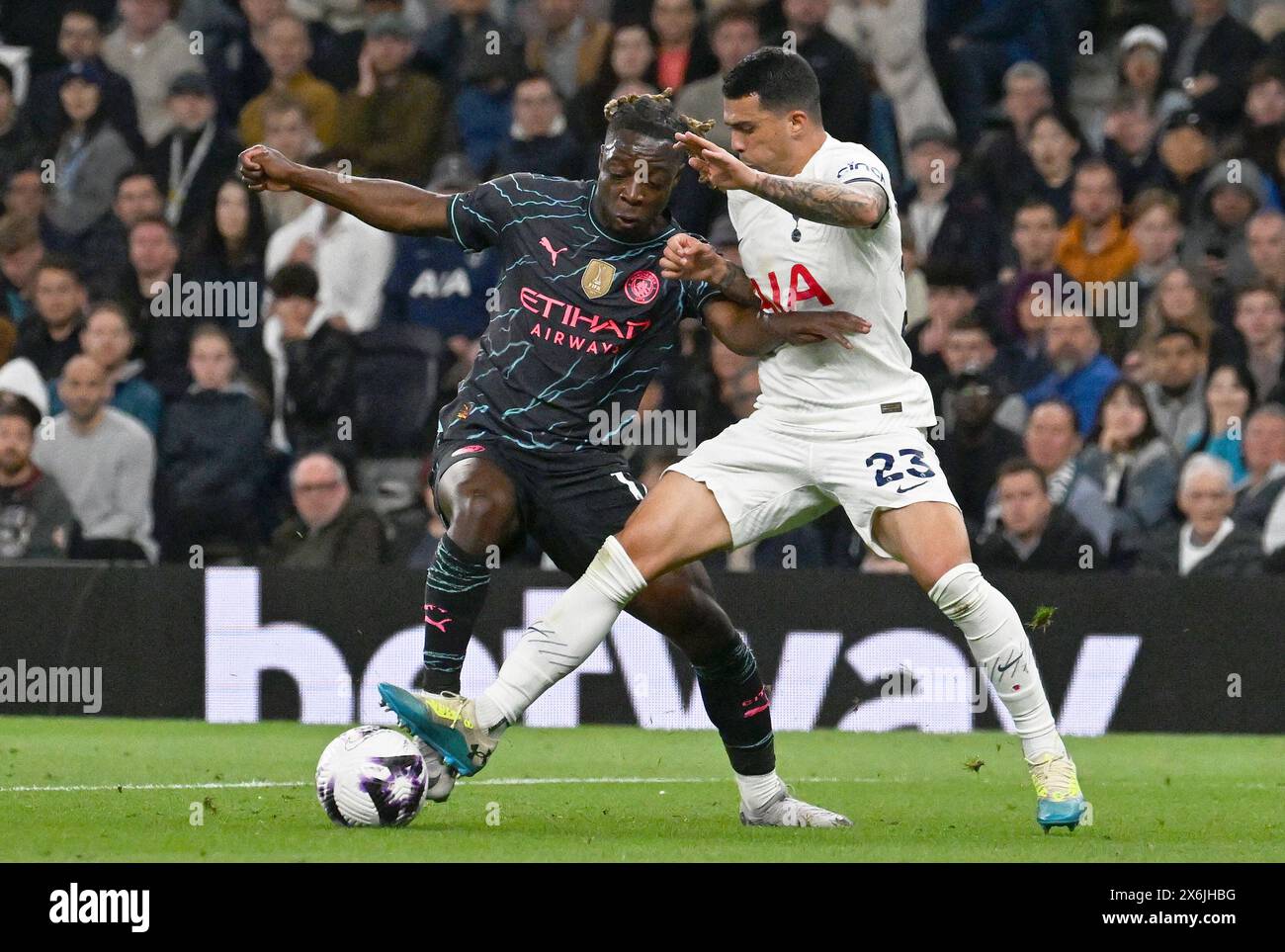 London, UK. 14th May, 2024. Jeremy Doku of Manchester City is fouled by Pedro Porro leading to a penalty. Premier League match, Tottenham Hotspur v Manchester City at the Tottenham Hotspur Stadium in London on Tuesday 14th May 2024. this image may only be used for Editorial purposes. Editorial use only pic by Sandra Mailer/Andrew Orchard sports photography/Alamy Live news Credit: Andrew Orchard sports photography/Alamy Live News Stock Photo