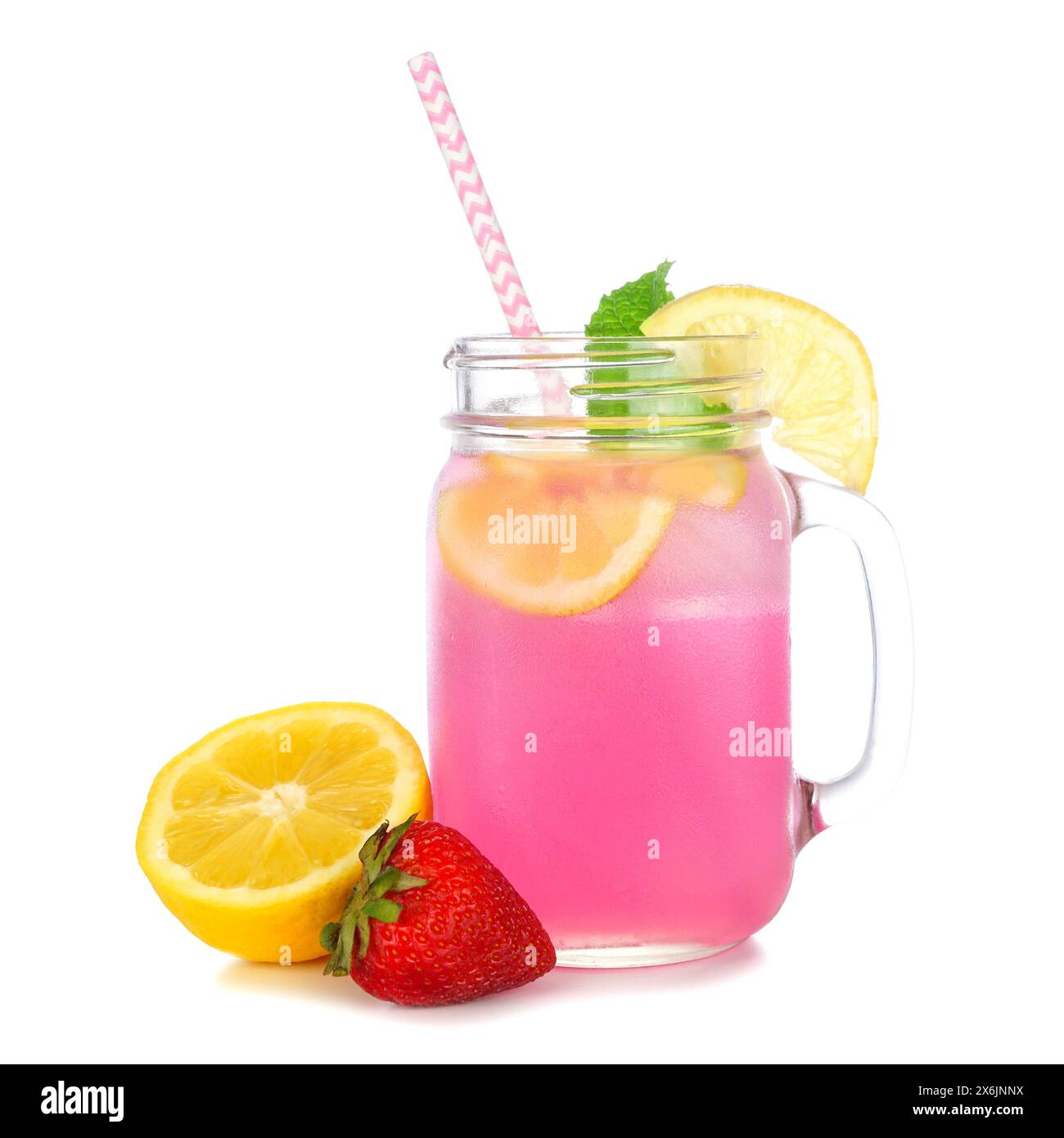 Summer iced pink lemonade in a mason jar glass with paper straw, lemon and strawberry isolated on a white background Stock Photo