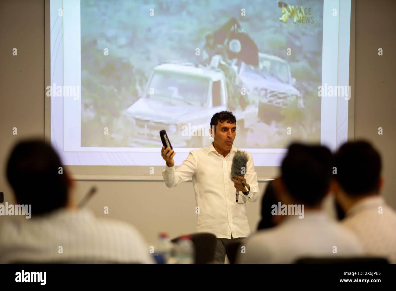 May 14, 2024: Gaziantep, Turkiye. 14 May 2024. Journalist Medyan Dairieh shows security devises to the audience during a workshop in Gaziantep on the safety of journalists. During the seminar, Dairieh addressed the rights of journalists to operate safely during their work, while focusing on the importance of security practices and protective equipment, such as body armour and helmet. A number of media students from Gaziantep University, as well as journalists and media professionals, attended the training workshop, which has been organised by the Canadian organisation ''Journalists for Human R Stock Photo