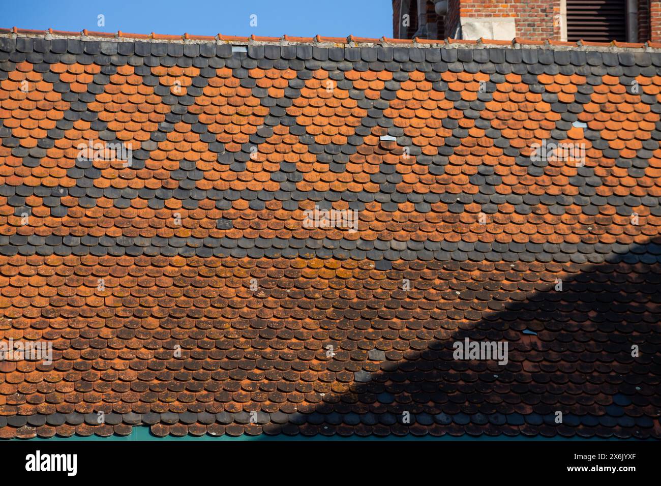 Seamless roof texture of flat red shingles with embedded line patterns ...