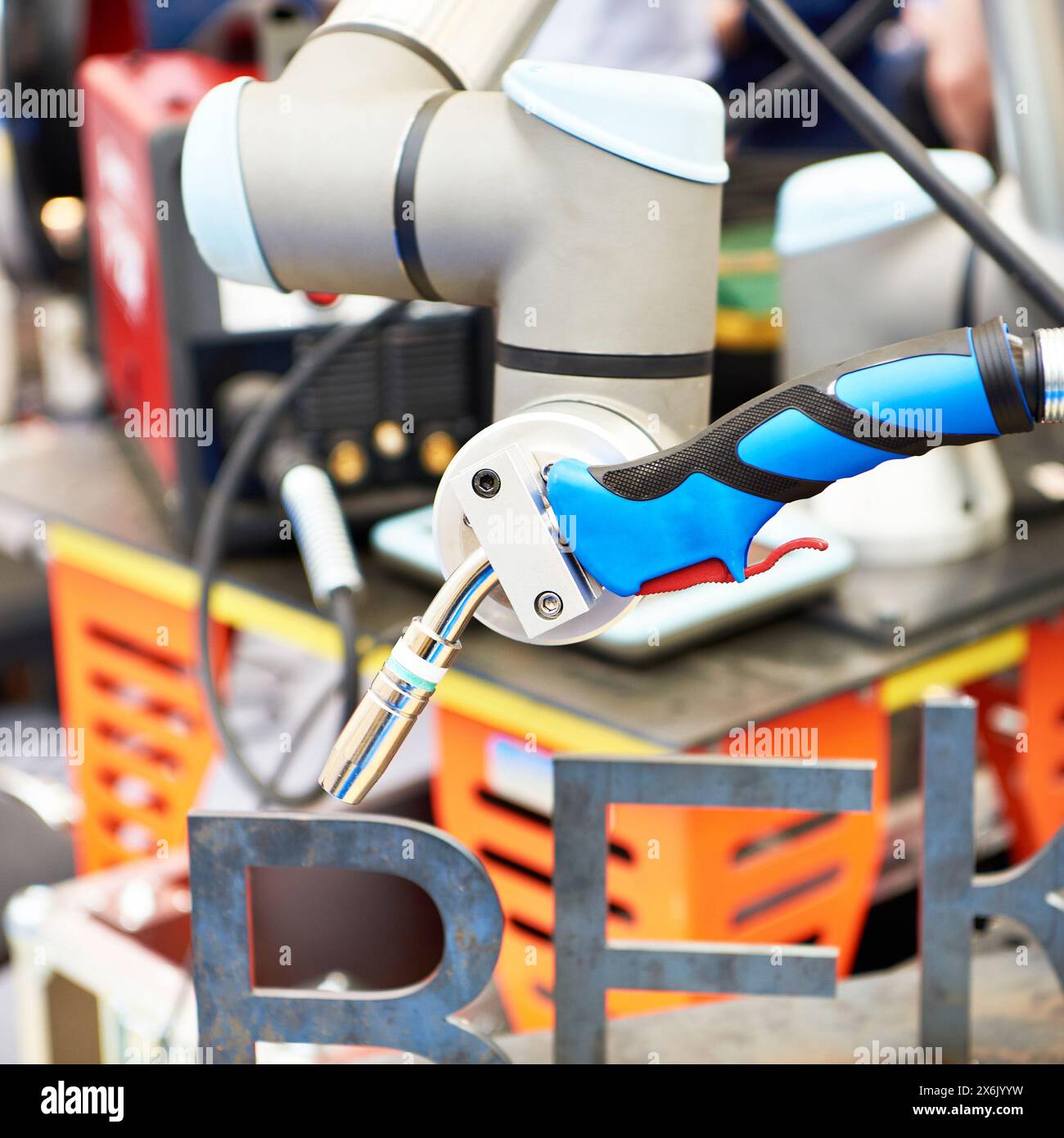 Robotic welding machine at the exhibition Stock Photo