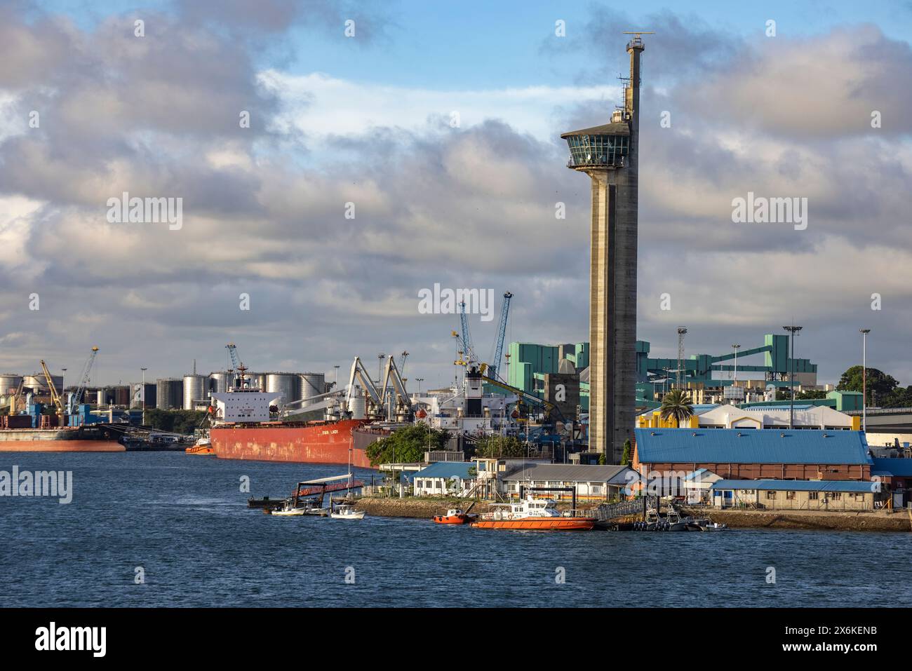 70m high port control tower and cargo ships, Mombasa, Kenya, Africa Stock Photo