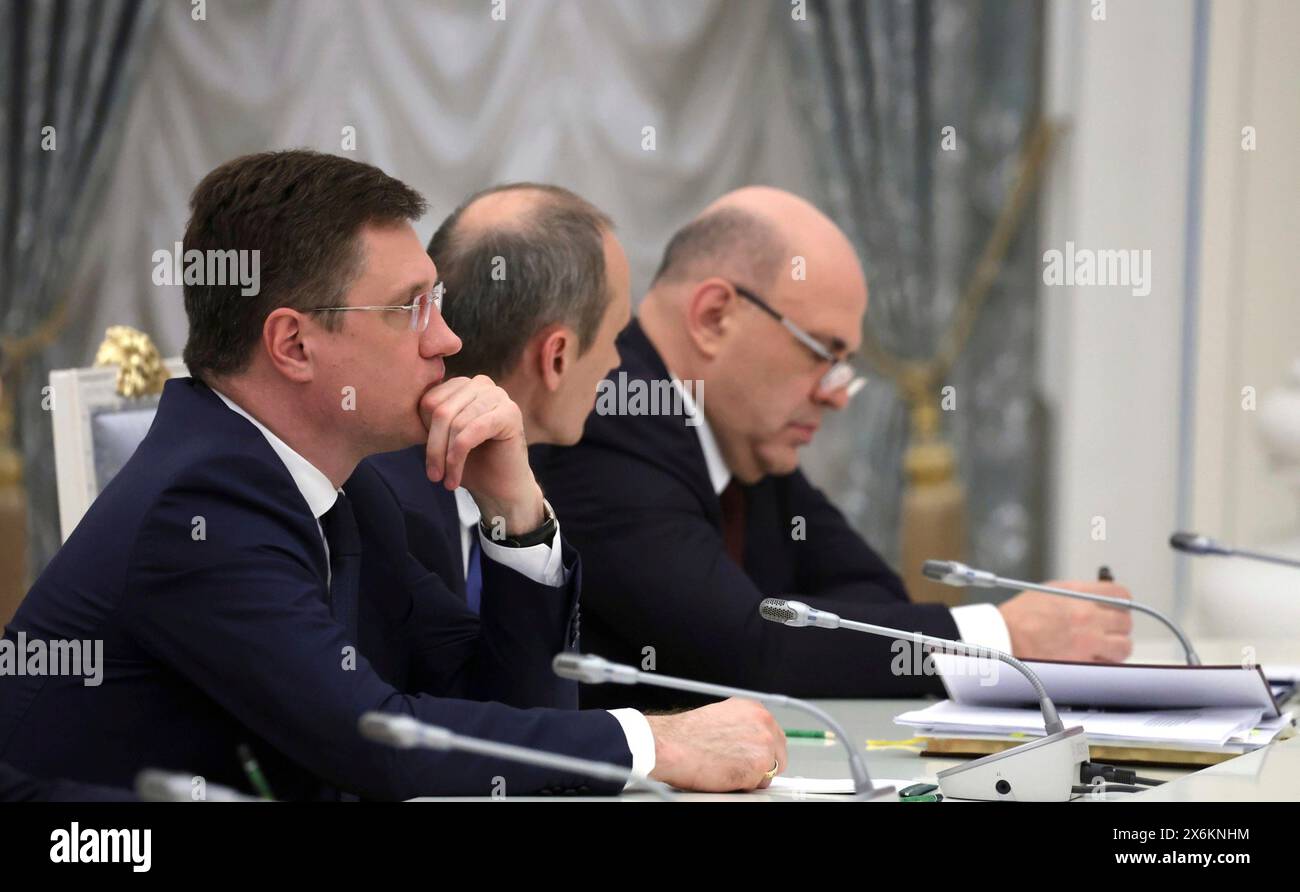 Moscow, Russia. 14th May, 2024. Newly appointed Russian Minister of Industry and Trade Anton Alikhanov, left, before the start of a government meeting called by President Vladimir Putin after appointing the new cabinet of ministers at the Kremlin, May 14, 2024, in Moscow, Russia. Credit: Vyacheslav Prokofyev/Kremlin Pool/Alamy Live News Stock Photo