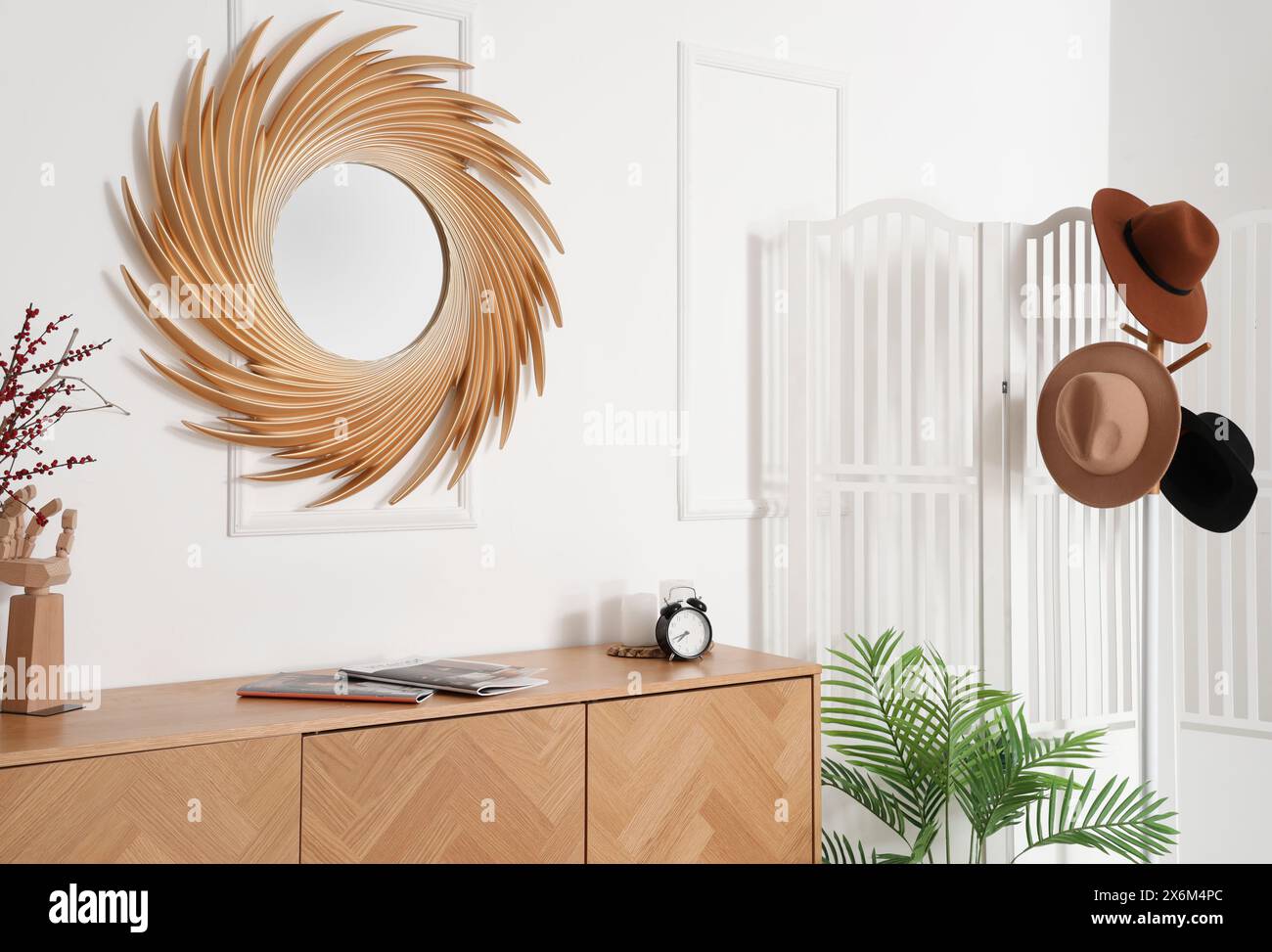 Interior of hall with golden mirror, commode and folding screen Stock ...