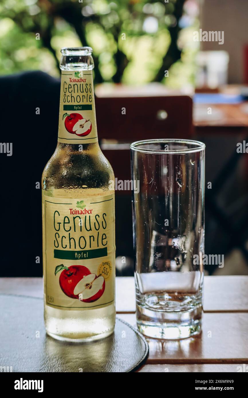 Schwangau, Germany - August 12, 2023: Genuss-Schorle apple drink in a restaurant in Germany Stock Photo
