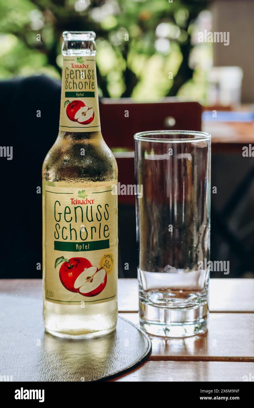 Schwangau, Germany - August 12, 2023: Genuss-Schorle apple drink in a restaurant in Germany Stock Photo