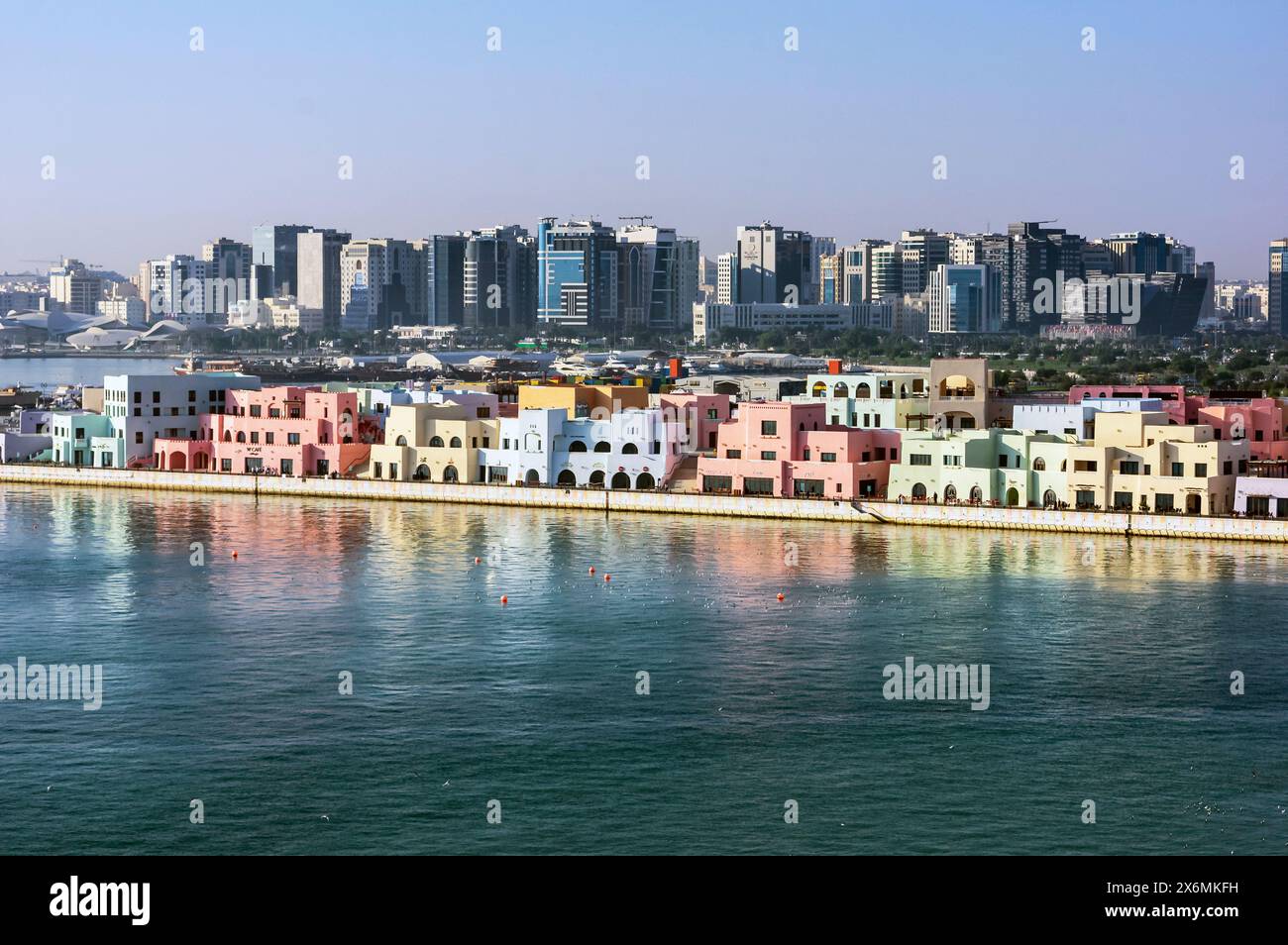 Harbor views with skyscrapers and ships in Doha, capital of Qatar in the Persian Gulf. Stock Photo