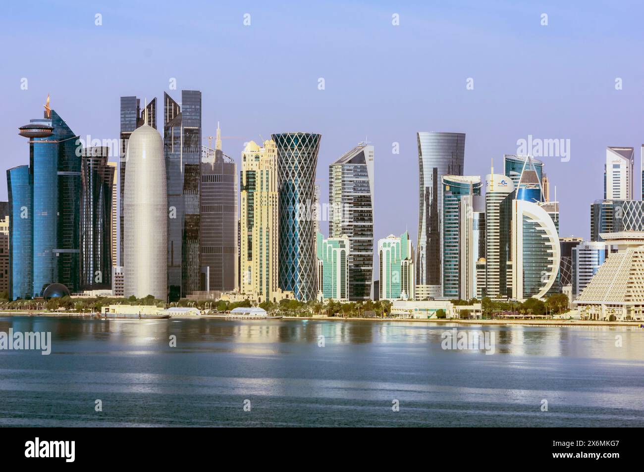 Harbor views, the Corniche with skyscrapers and ships in Doha, capital ...