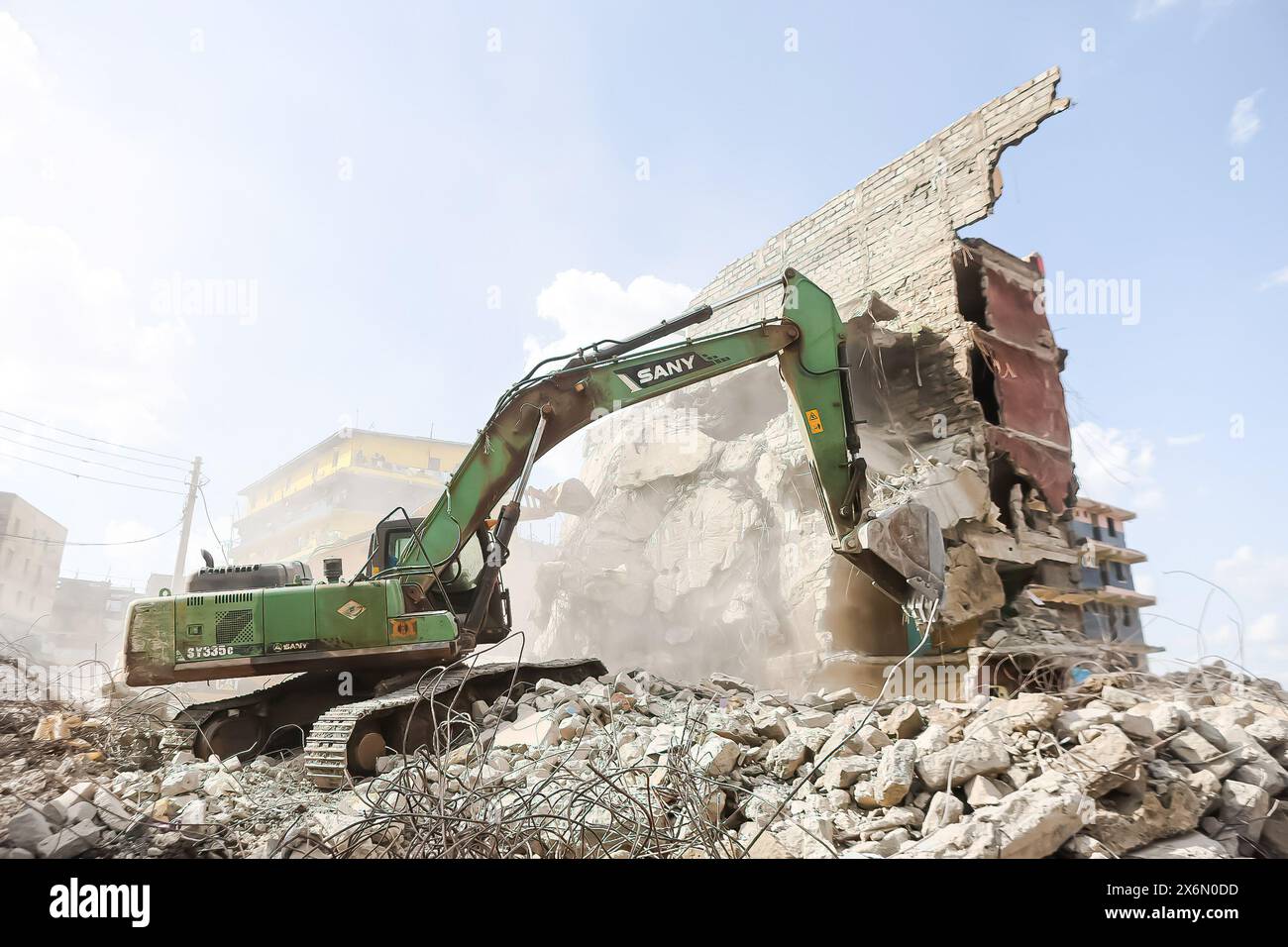 A building is demolished in Mathare as rescue operations continue to ...
