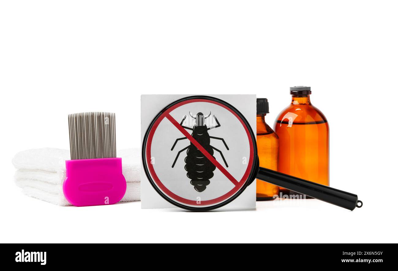Cosmetic products, lice comb and magnifying glass isolated on white