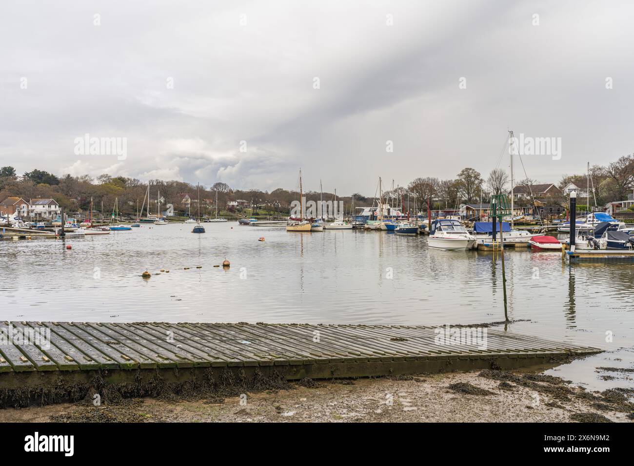 Wootton Bridge, Isle of Wight, England, UK - April 16, 2023: Boats on the banks of Wootton Creek Stock Photo