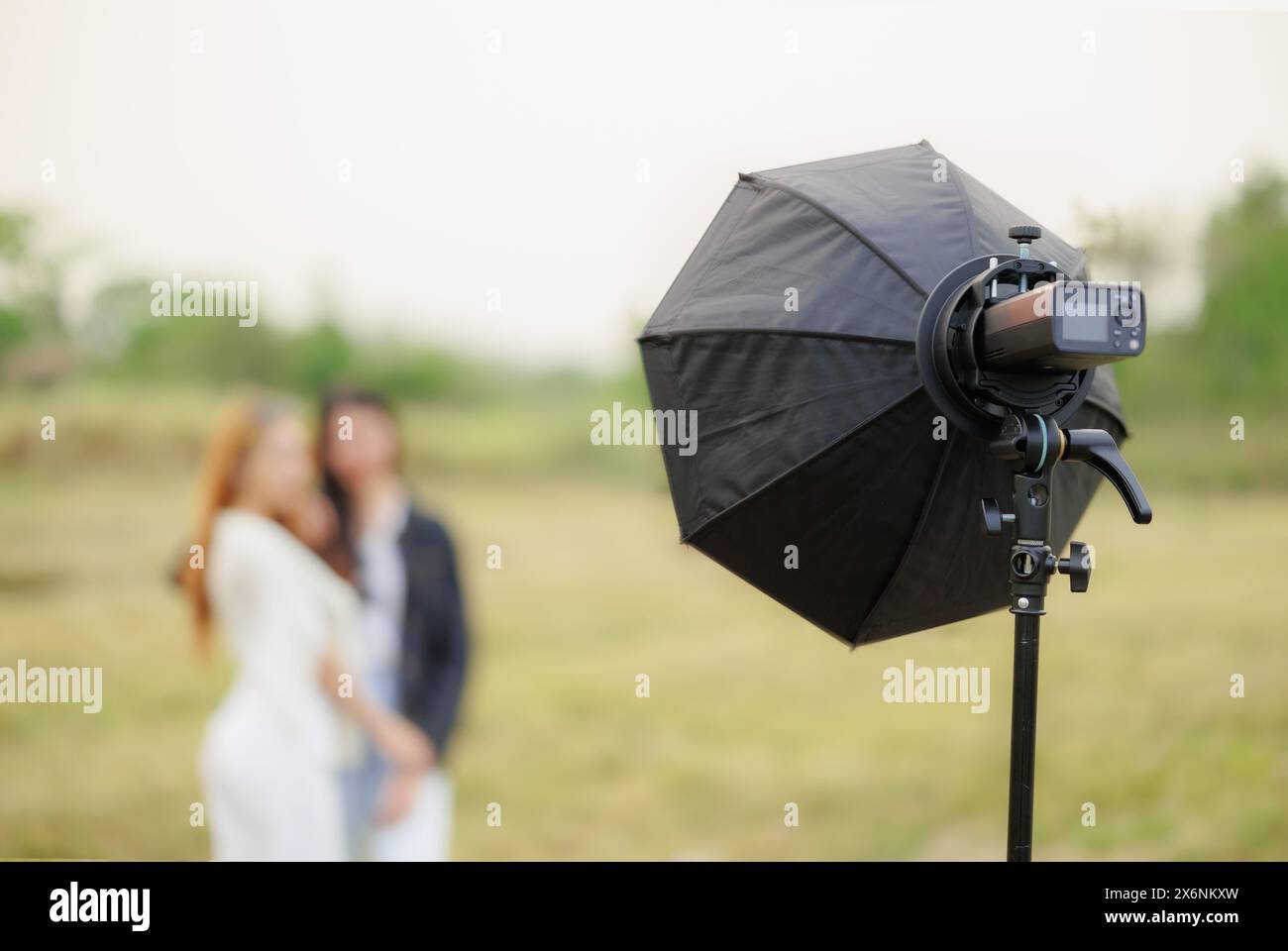 portable flash light setup with reflector modifier for portrait