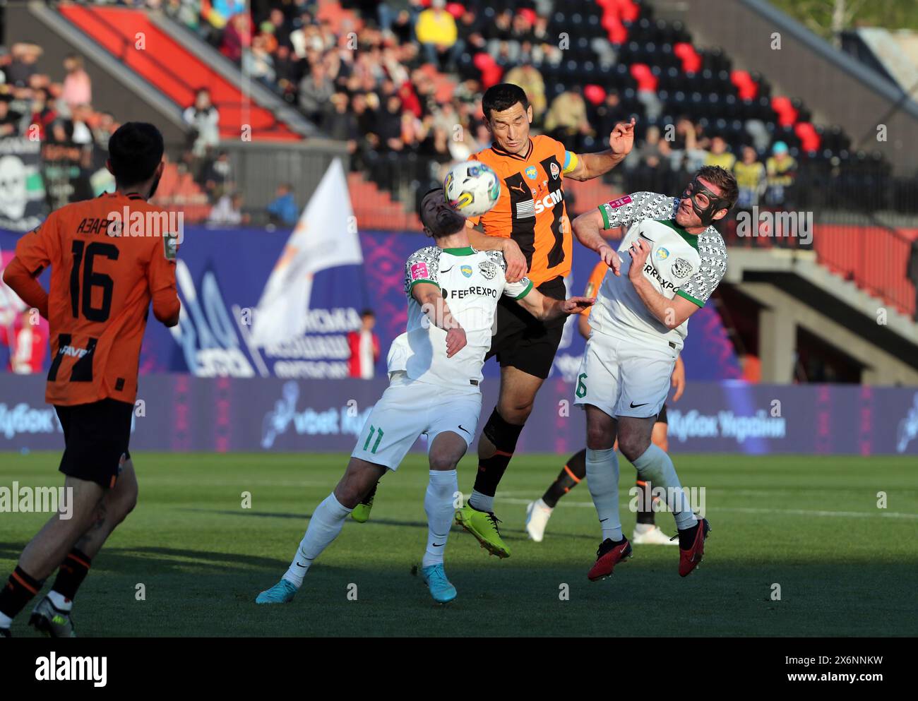 RIVNE, UKRAINE - MAY 15, 2024 - Midfielder Taras Stepanenko (C) of FC Shakhtar Donetsk is seen in action with players of FC Vorskla Poltava during the 2023/24 Ukrainian Cup final match at the Avanhard Stadium, Rivne, western Ukraine. The Orange-and-Blacks claimed a 2-1 win over their rivals from Poltava and took home the Ukrainian Cup for the 14th time. On May 11, the Miners won the 2023/24 Ukrainian Premier League title early by beating FC Dynamo Kyiv 1-0 in Lviv. Thus, the Donetsk team achieved a golden double for the 2023/24 season and became the most decorated club since Ukraine’s independ Stock Photo