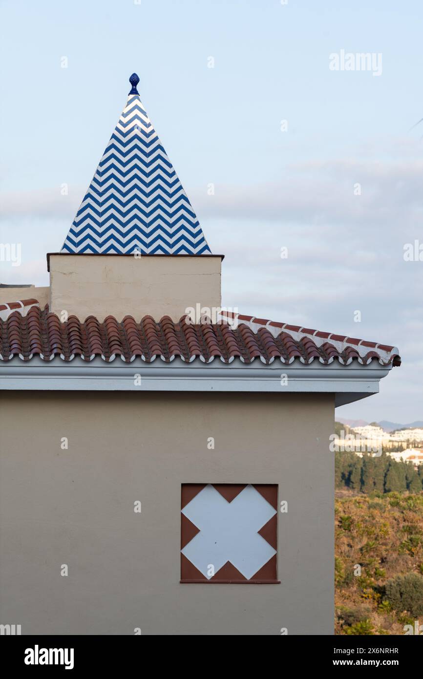 Detail of  modern Spanish architecture and building design with decorative rooftop in Andalusia, southern Spain. Stock Photo