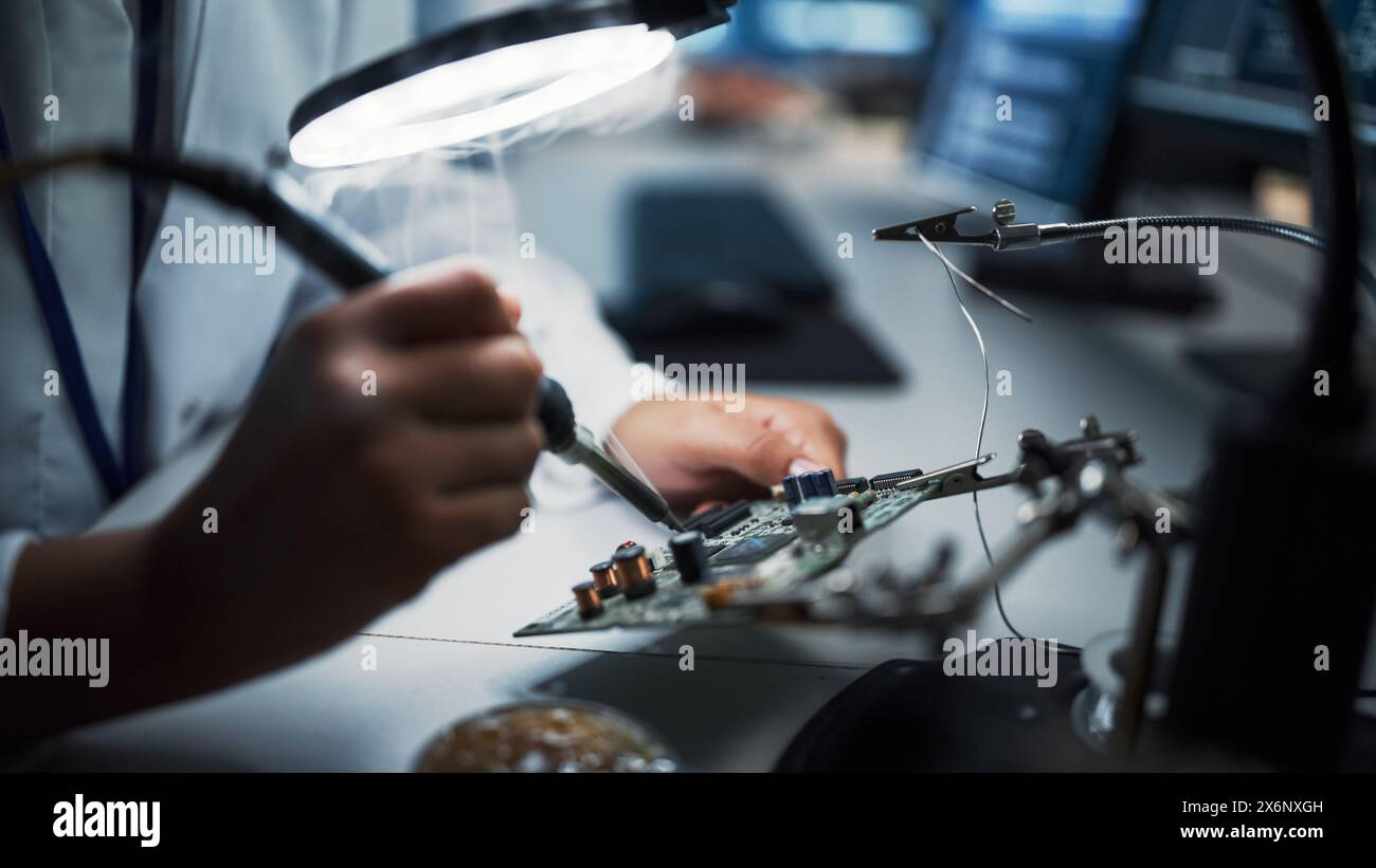 Modern Electronics Research, Development Facility: Female Engineer Does ...