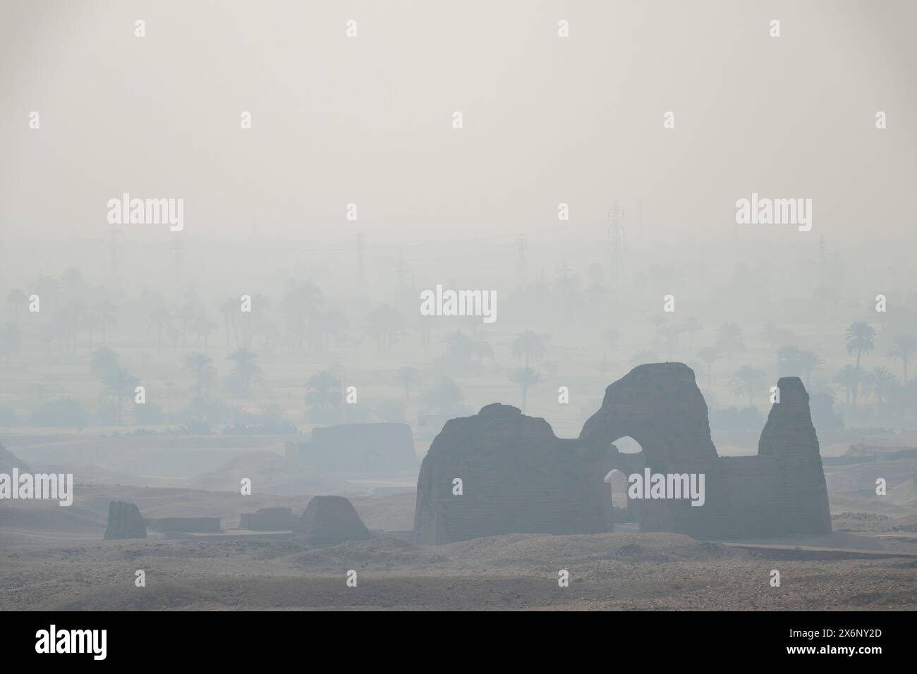 Misty view of the mud brick walls of the necropolis known as the Asasif Tombs close to Hatshepsuts Temple at Deir el-Bahri, Luxor, Egypt Stock Photo