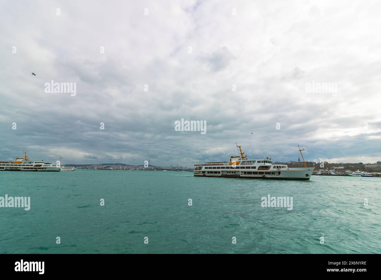 Istanbul view from Galata Bridge with Anatolian side and ferry. Visit Istanbul concept photo. Stock Photo