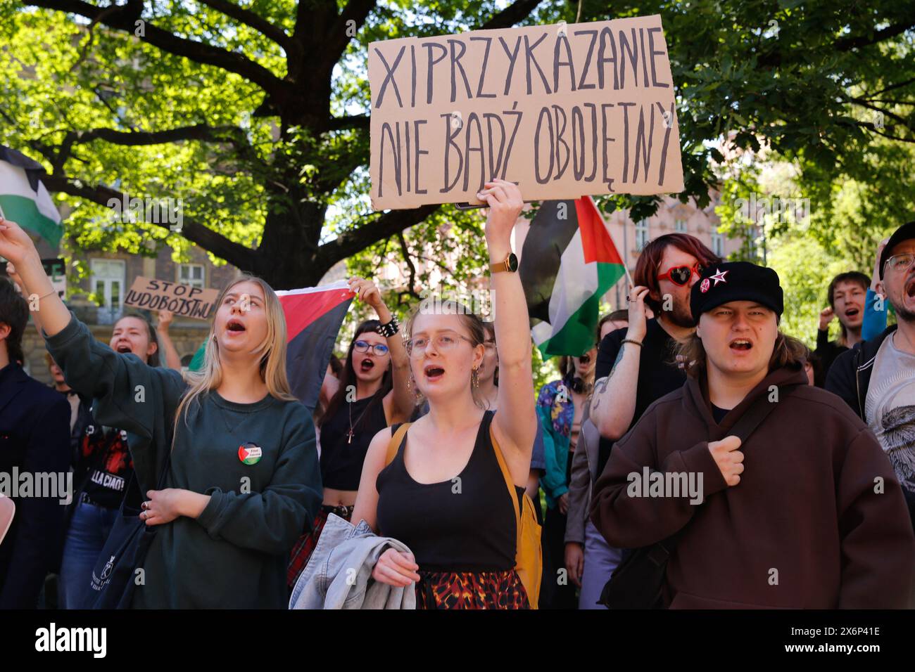 Students chant pro-Palestine slogans and hold Palestinian flags and banners during the first in Poland demonstration organized by students and scholars against Israeli attack on Gaza Strip in front of Collegium Novum, the office of Jagiellonian University dean in Krakow, Poland on May 15, 2024. Stock Photo