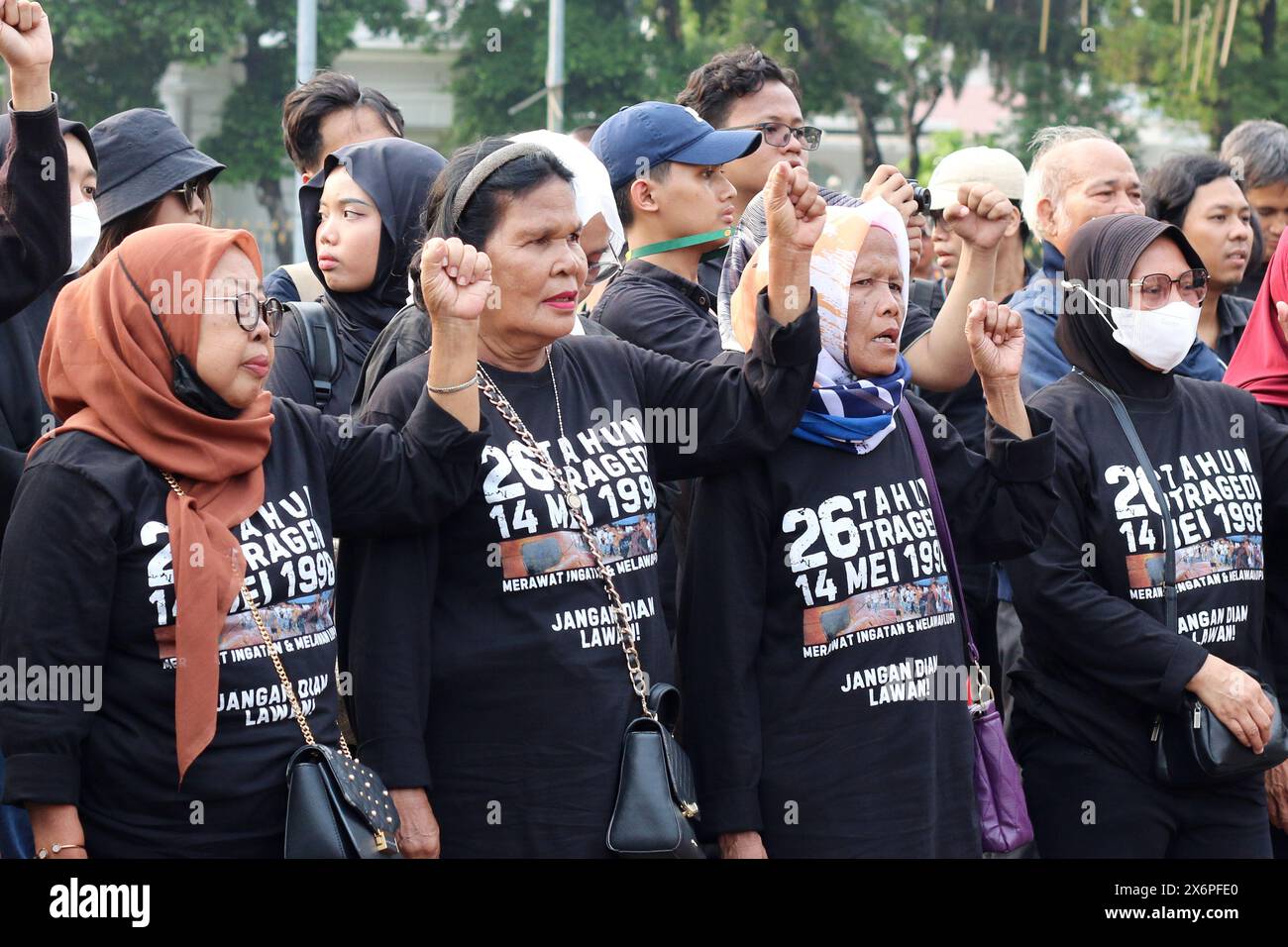 Members of the Victim Solidarity Network for Justice (JSKK) hold the 815th Kamisan rally Action in front of the preidential palace (Merdeka Palace) in Jakarta on Thursday (16/05/2024). The protest also commemorated the 26th anniversary of the Trisakti and Semanggi tragedies on May 13-15, 1998. Stock Photo