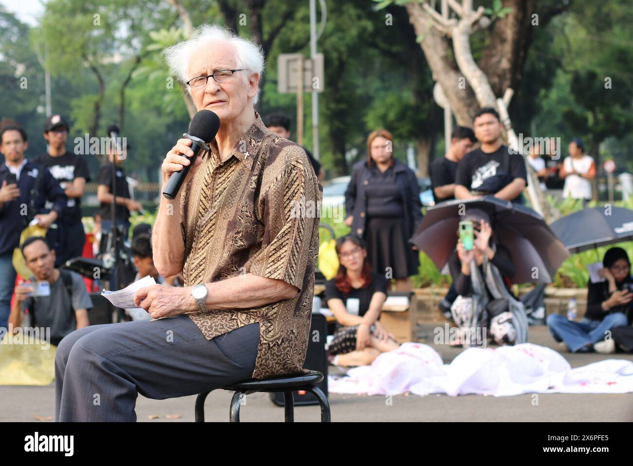 Germany-born Father Franz Magnis-Suseno made speech during a Kamisan Action in front of the preidential palace (Merdeka Palace) in Jakarta on Thursday (16/05/2024). Kamisan Action is weekly 'Kamisan' silent protest against violations of human rights in Jakarta. Stock Photo