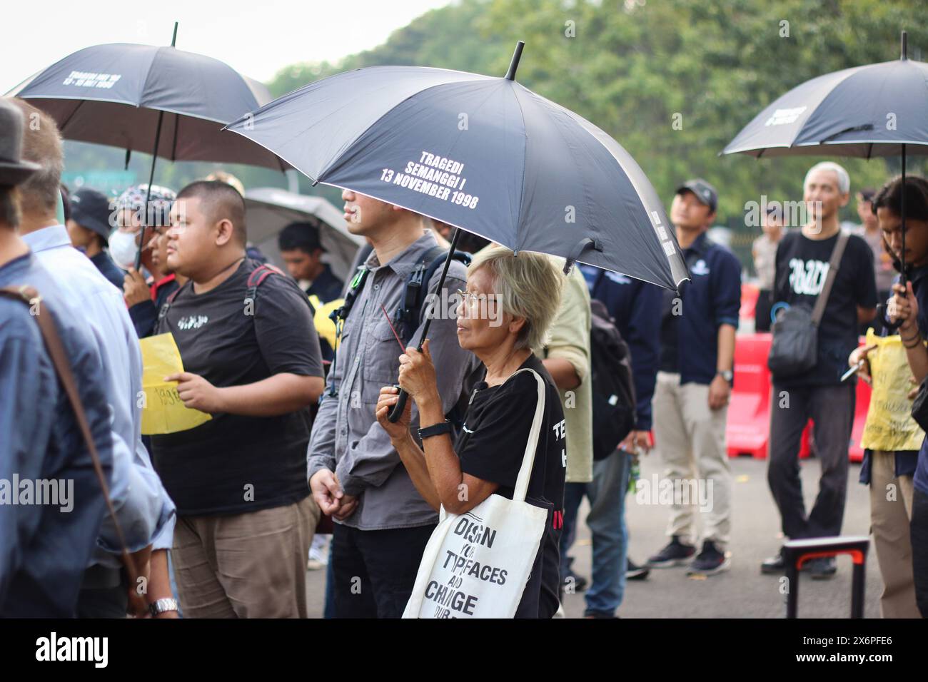 Maria Catarina Sumarsih, mother of Wawan who killed during the political turmoil of 1998, takes part in a weekly Kamisan action silent protest against violations of human rights in front of the preidential palace (Merdeka Palace) in Jakarta on Thursday (16/05/2024). Stock Photo