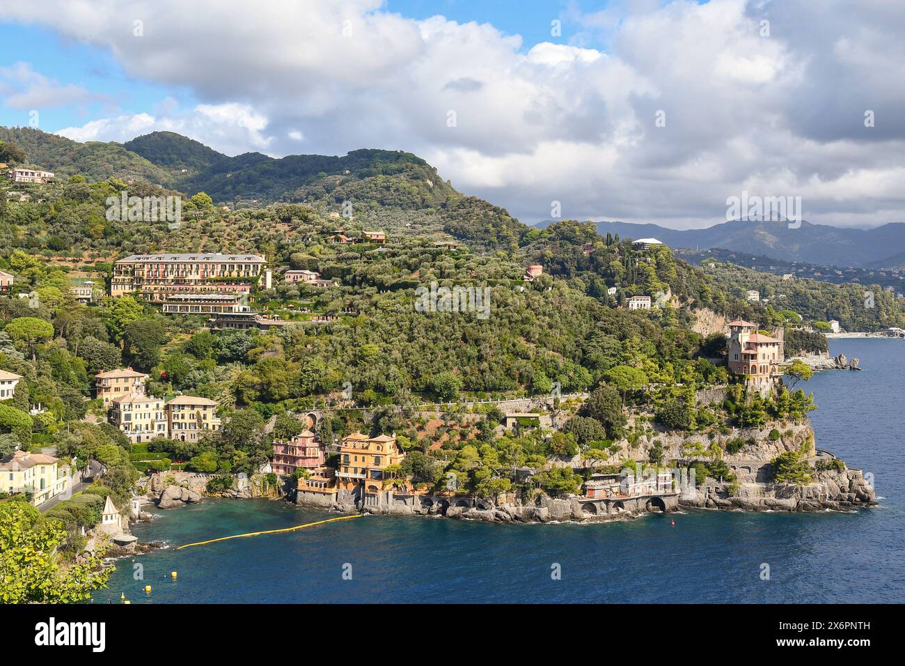 Elevated view of Cannon Bay with the promontory of Punta Cajega, historic villas and the 5 star Belmond Splendido Hotel, Portofino, Genoa, Italy Stock Photo