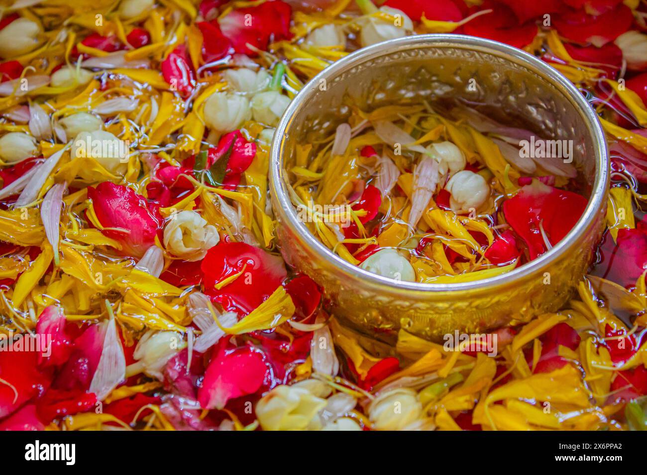 In Songkran Day, pour water on the hands of revered elders and ask for