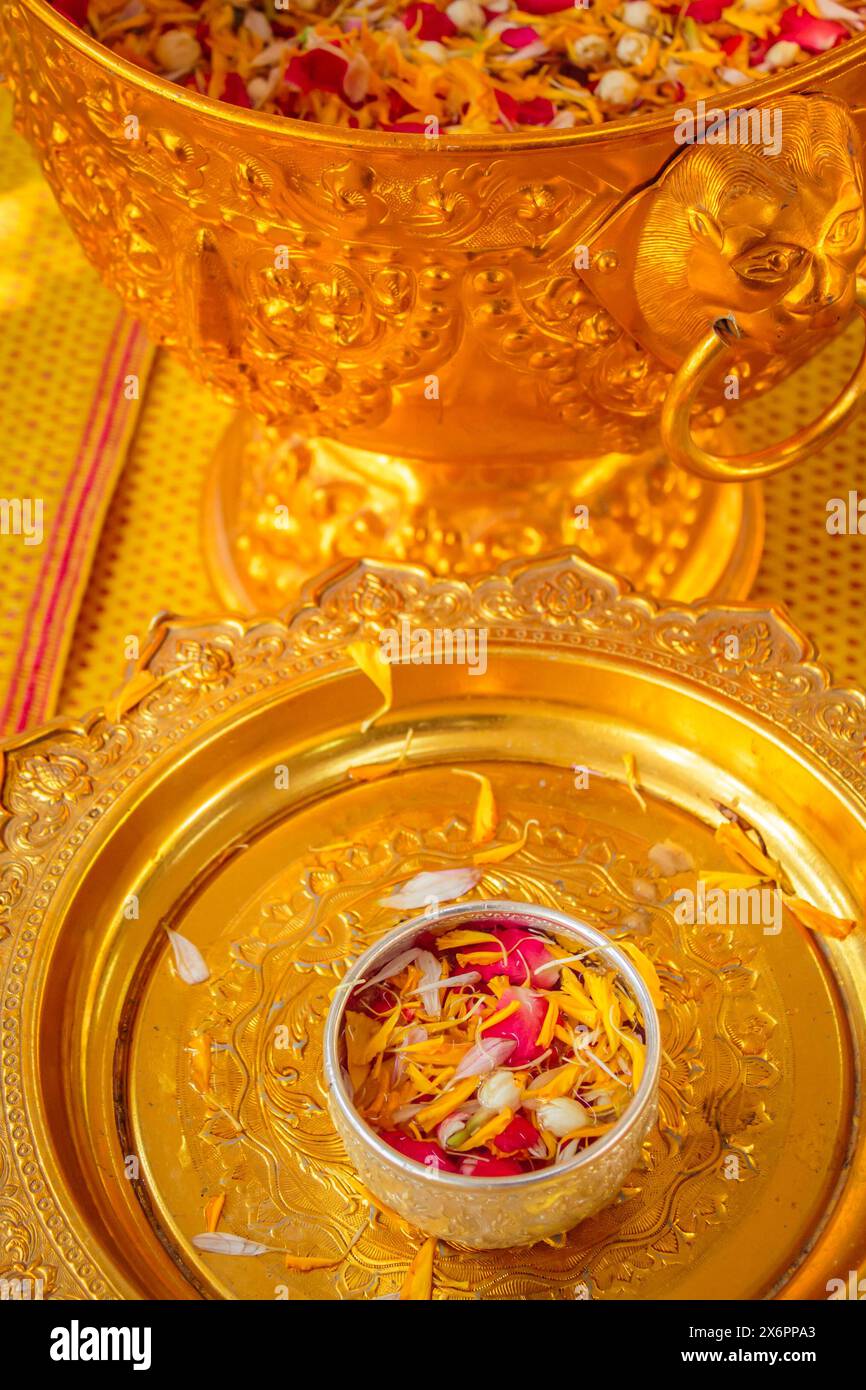 In Songkran Day, pour water on the hands of revered elders and ask for