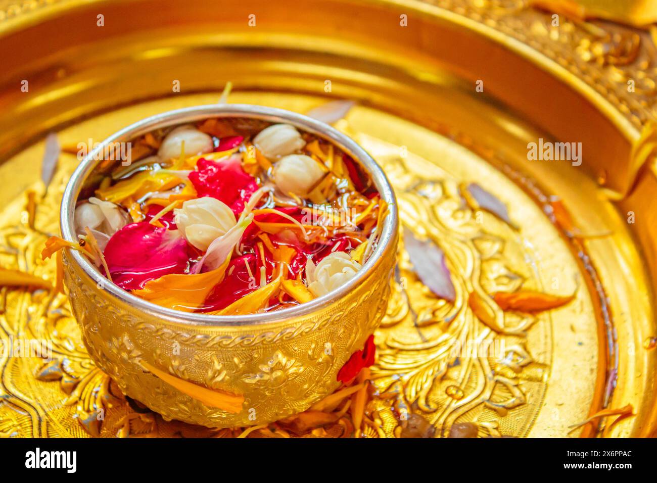 In Songkran Day, pour water on the hands of revered elders and ask for