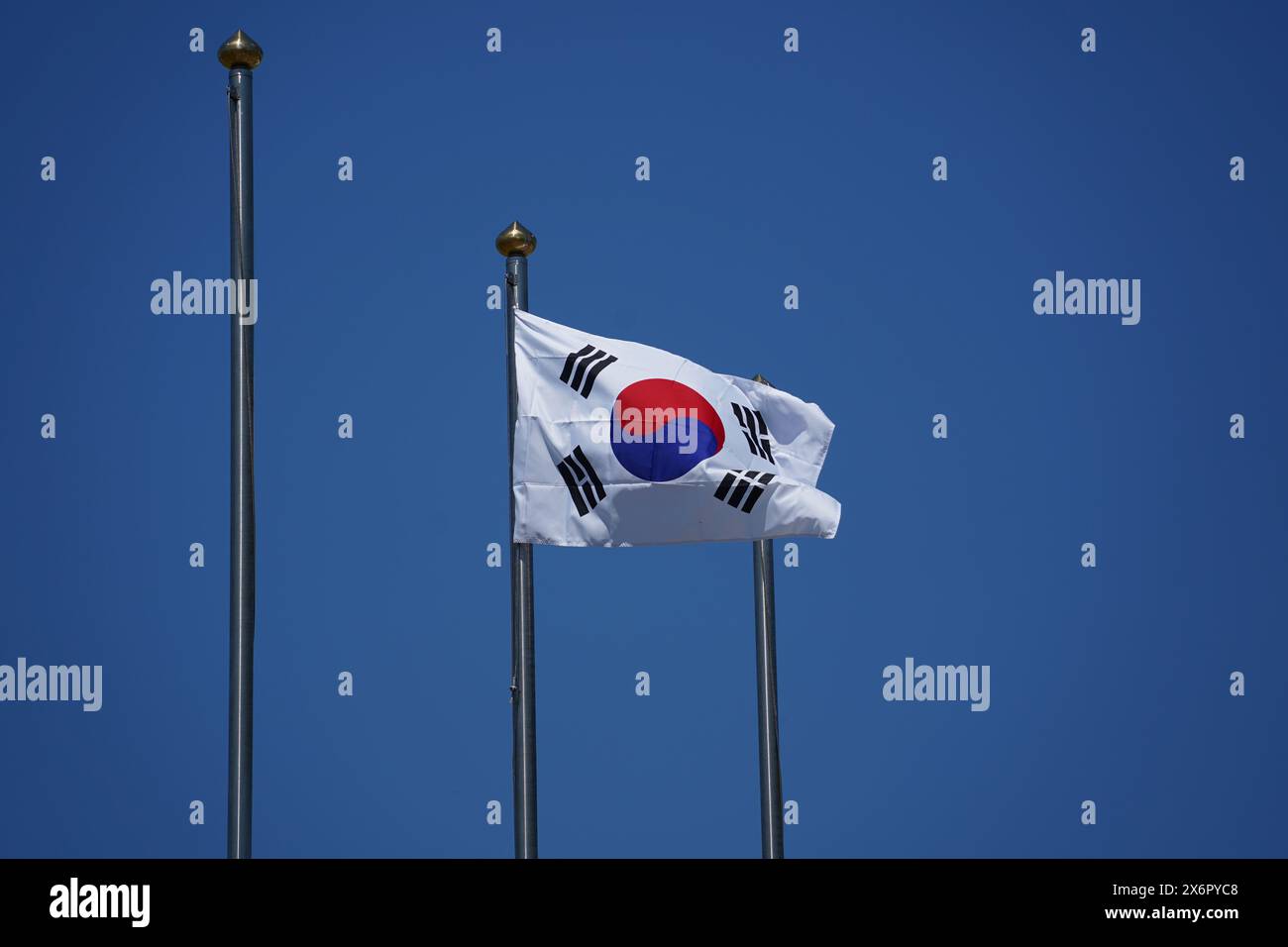 Flag of South Korea waving in the wind against a blue sky. Stock Photo
