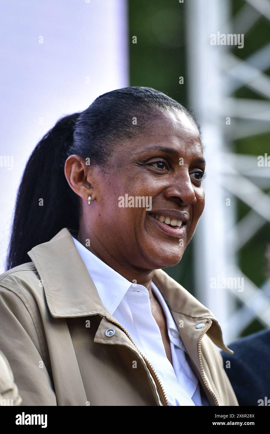 French sprinter and Olympic champion Marie-Jose Perec looks on as she ...