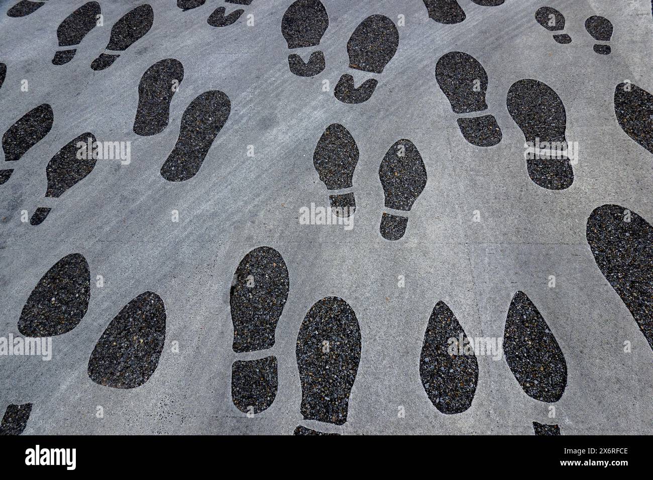 footprints in pedestrian crosswalk in Montgomery Alabama Stock Photo