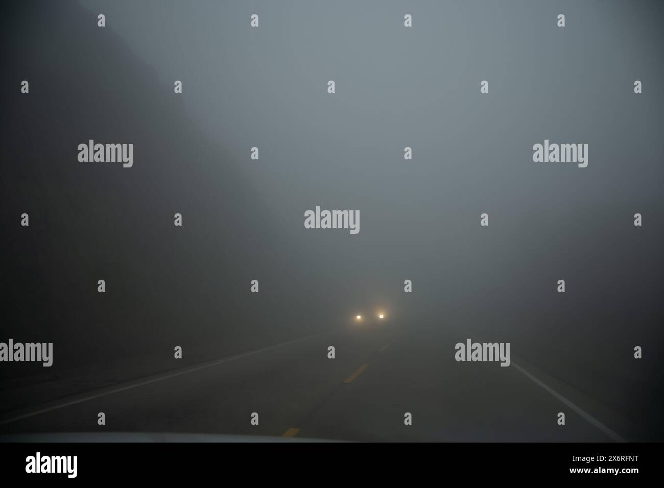 Dark foggy country road hi-res stock photography and images - Alamy