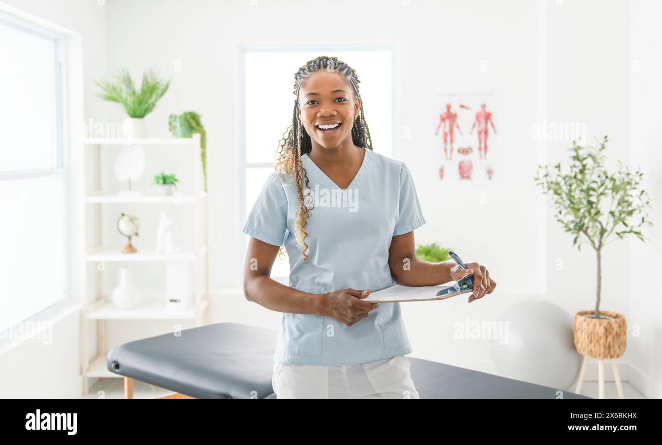 portrait of a black physiotherapy person in uniform Stock Photo - Alamy
