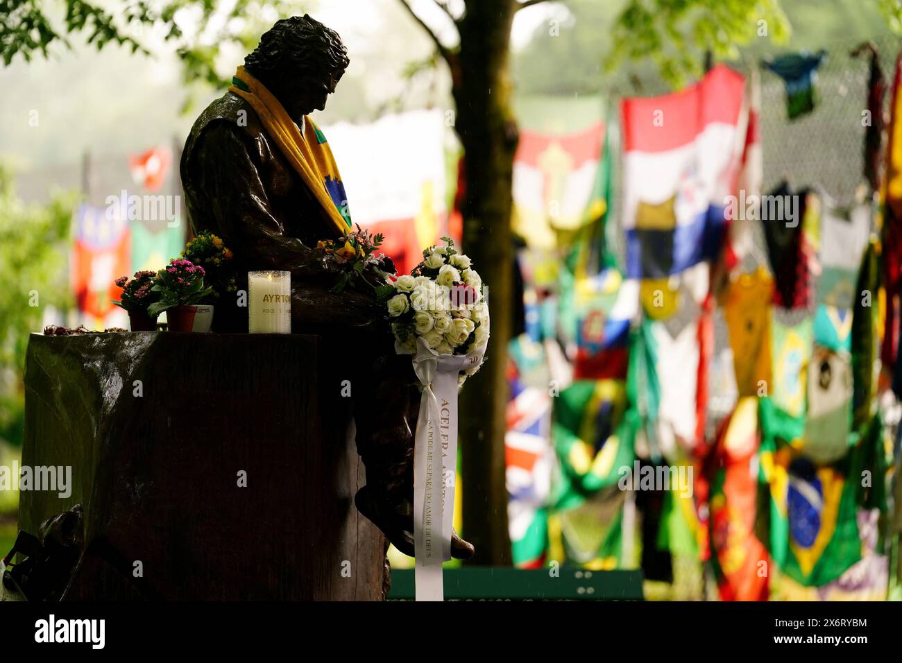 Tributes are laid at the Ayrton Senna Memorial at the Autodromo ...