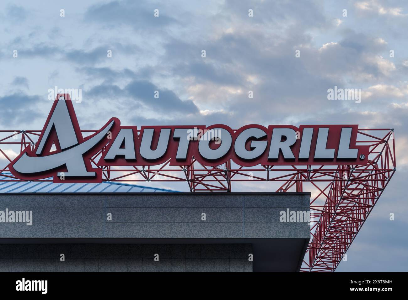 Sign Autogrill above the entrance to a highway restaurant operated by Autogrill SpA on the A10