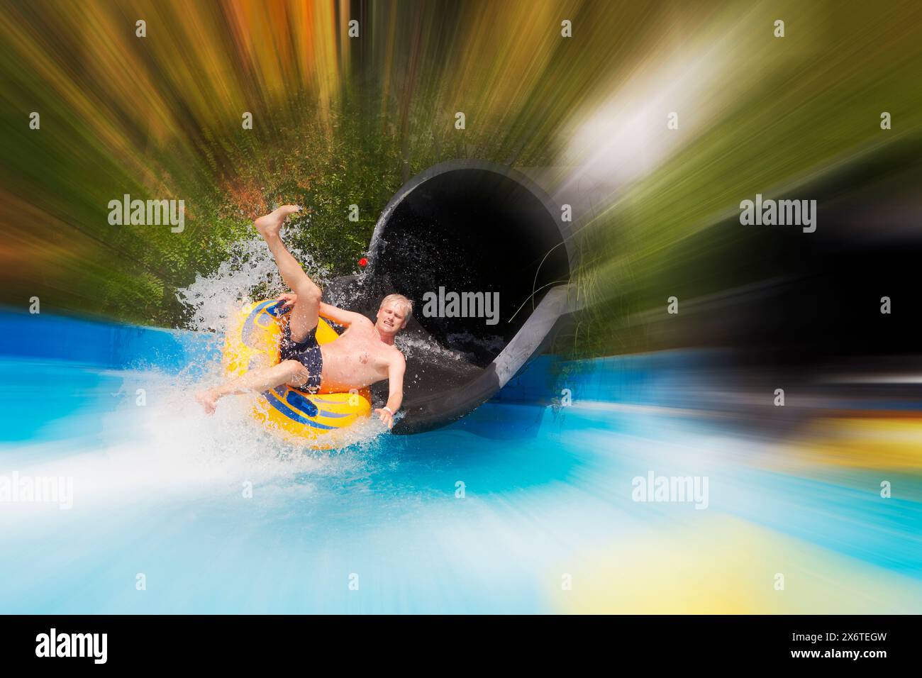 Man sliding in tube aqua hi-res stock photography and images - Alamy