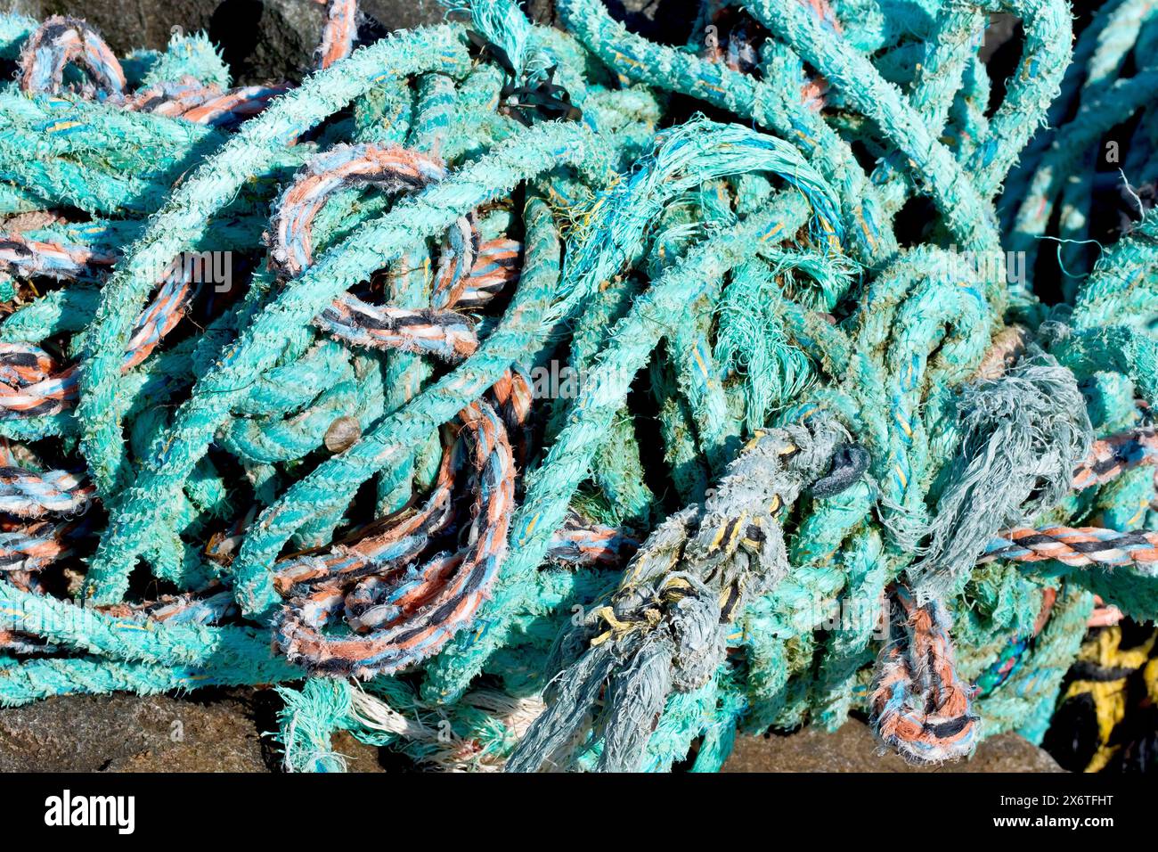 Close up of a tangle of plastic or nylon ropes used in the fishing ...