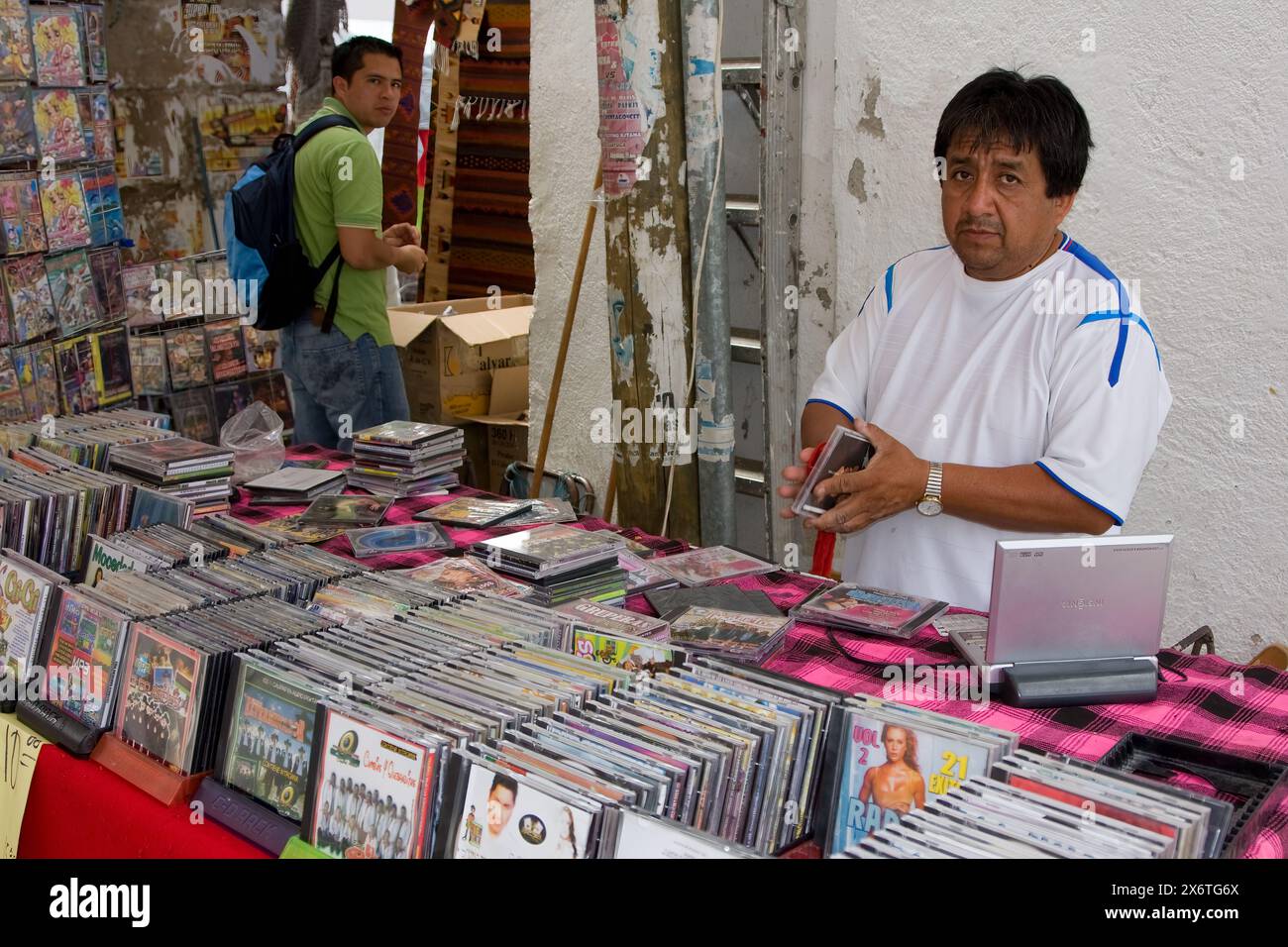 Tlacolula, Oaxaca, Mexico. Tlacolula Market. Mexican Man Selling CDs and DVDs Stock Photo Alamy