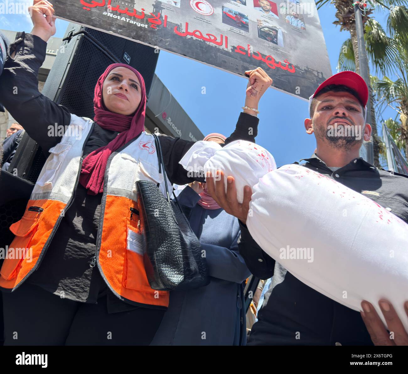 People putting up Palestinian flags march in Ramallah, West Bank on May 15, 2024. A large-scale demonstration is held in the Palestinian autonomous re Stock Photo