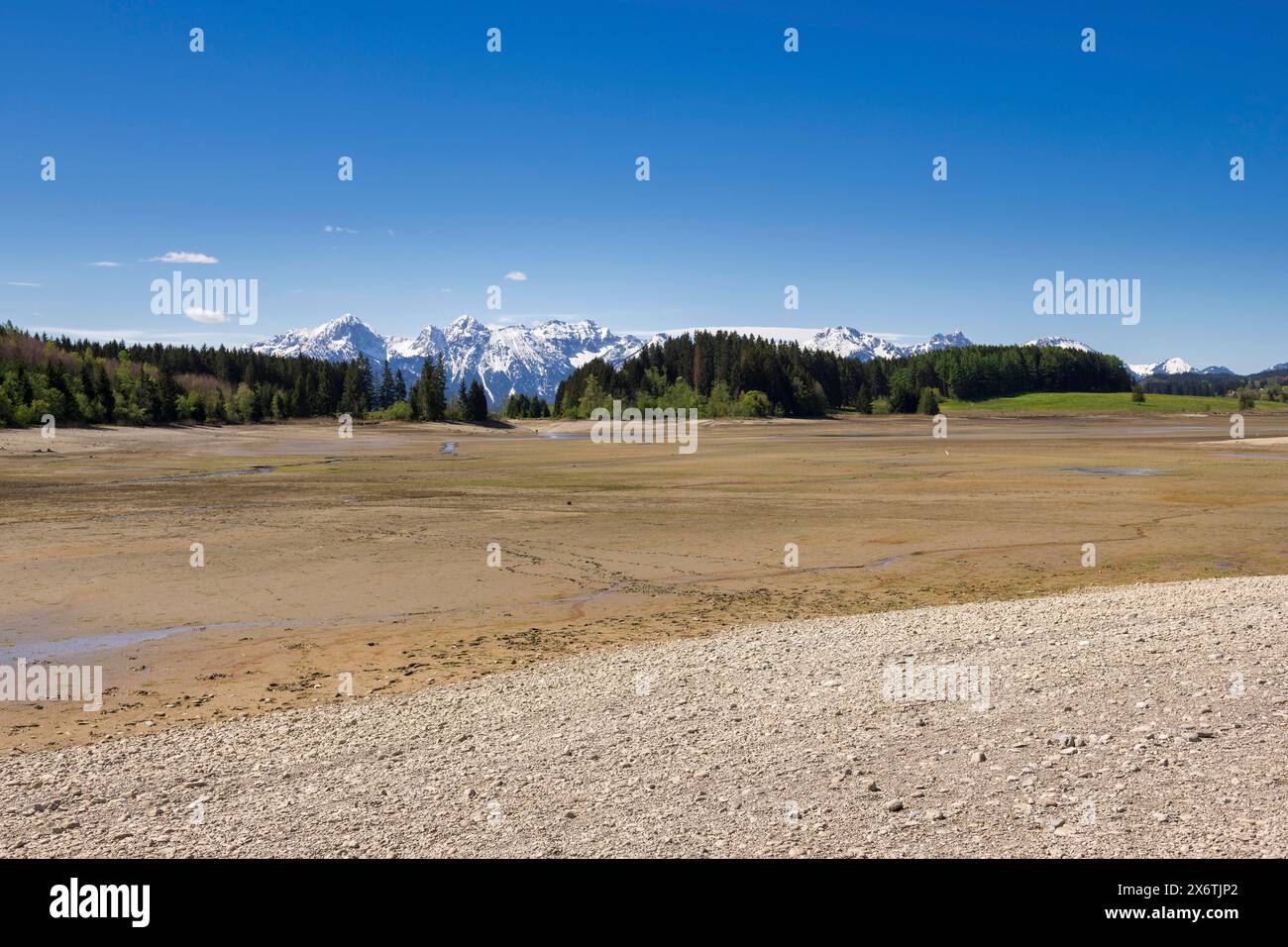 Drained Forggensee, empty, reservoir, flood protection, Allgaeu Alps, snow, Ostallgaeu, Bavaria, Germany Stock Photo