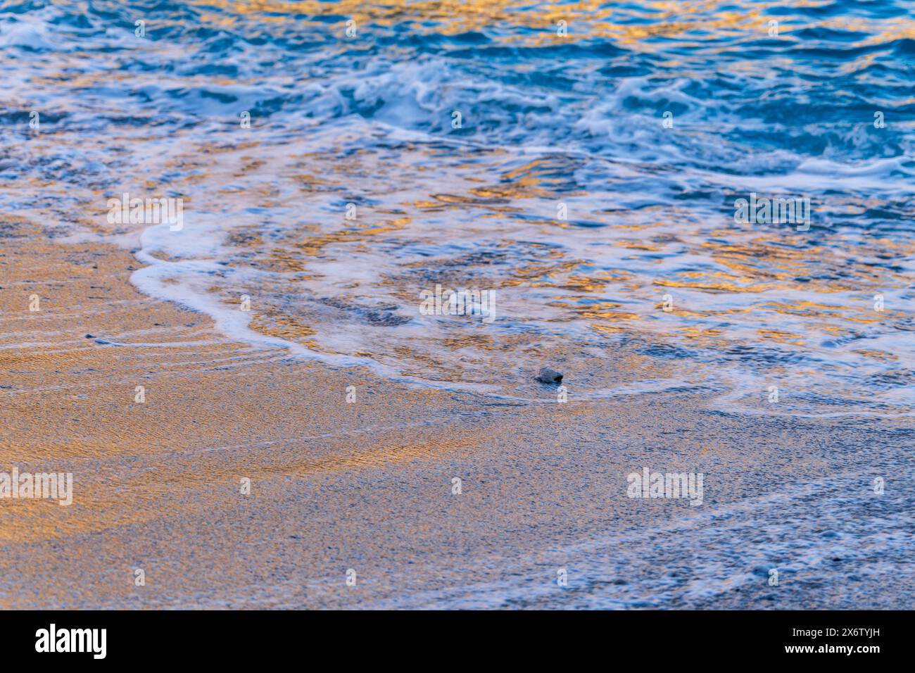 orange tones over the sea, Cala Magraner, Manacor coast, Majorca, Balearic Islands, Spain. Stock Photo