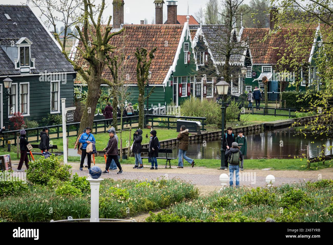 Zaanse Schans, typical traditional houses next to the canal, Zaanstad Municipality, European Route of Industrial Heritage, Netherlands. Stock Photo